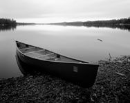 photo of canoe and lake